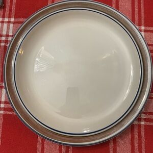 Elegant Cream Dinner Plate with Blue and Brown Accents